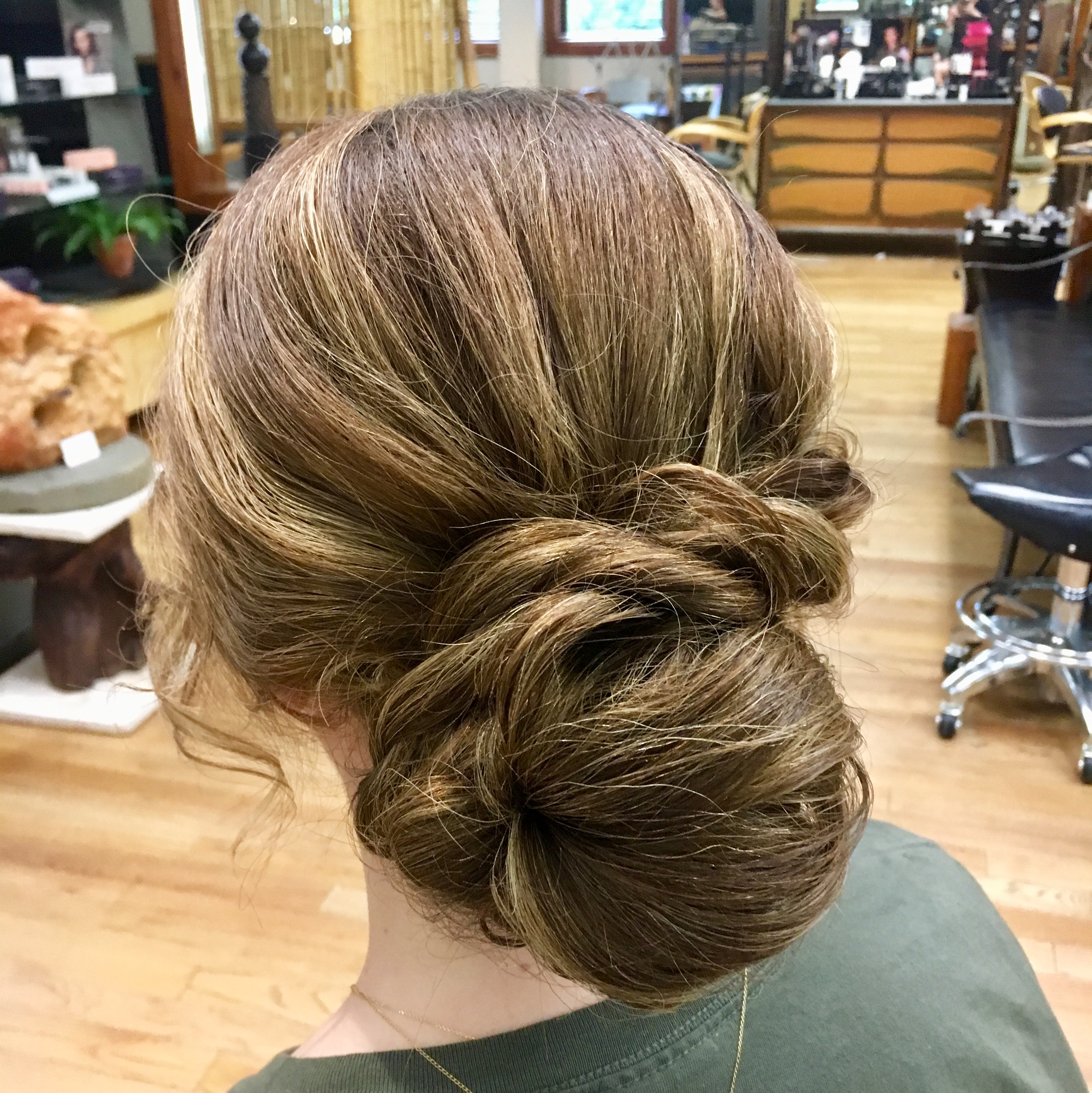 Photo of woman with hair twisted and pinned into an elegant updo.