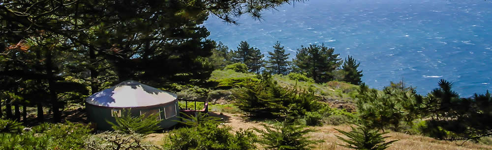 Picture of yurt on the cliffside.